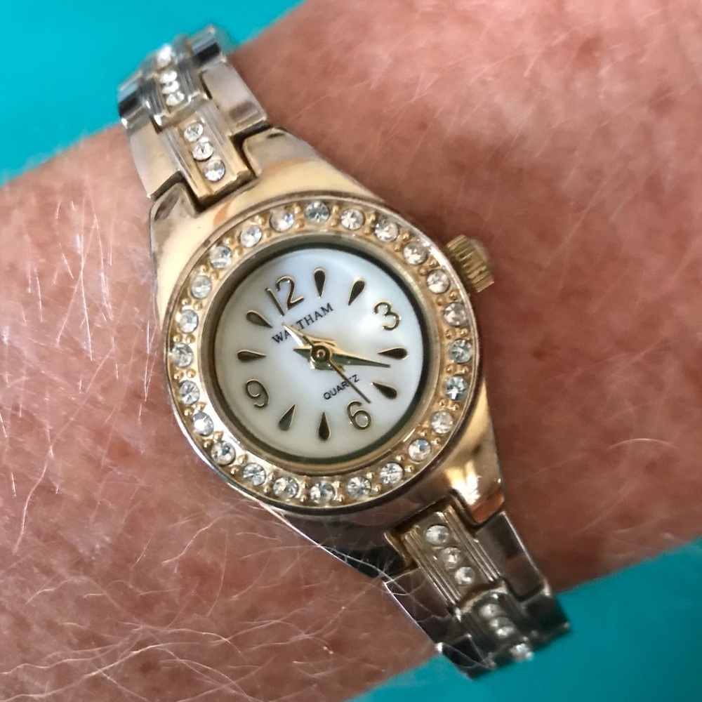 Women’s Waltham stainless steel watch is Gold/Silver with beautiful Gemstones